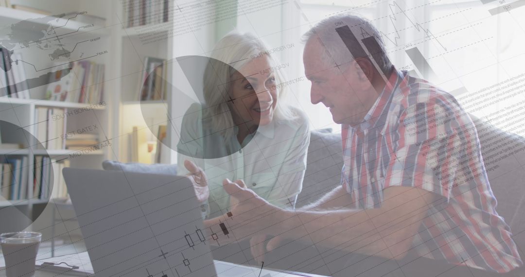 Senior Couple Analyzing Data on Laptop at Home