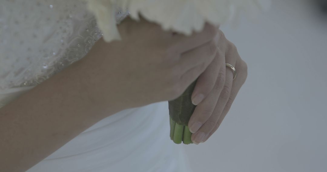 Bride Holding Wedding Bouquet in Intimate Moment - Free Images, Stock Photos and Pictures on Pikwizard.com