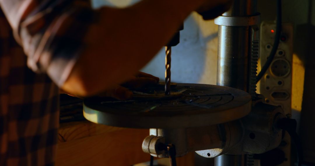 Person Using Drill Press in Workshop - Free Images, Stock Photos and Pictures on Pikwizard.com