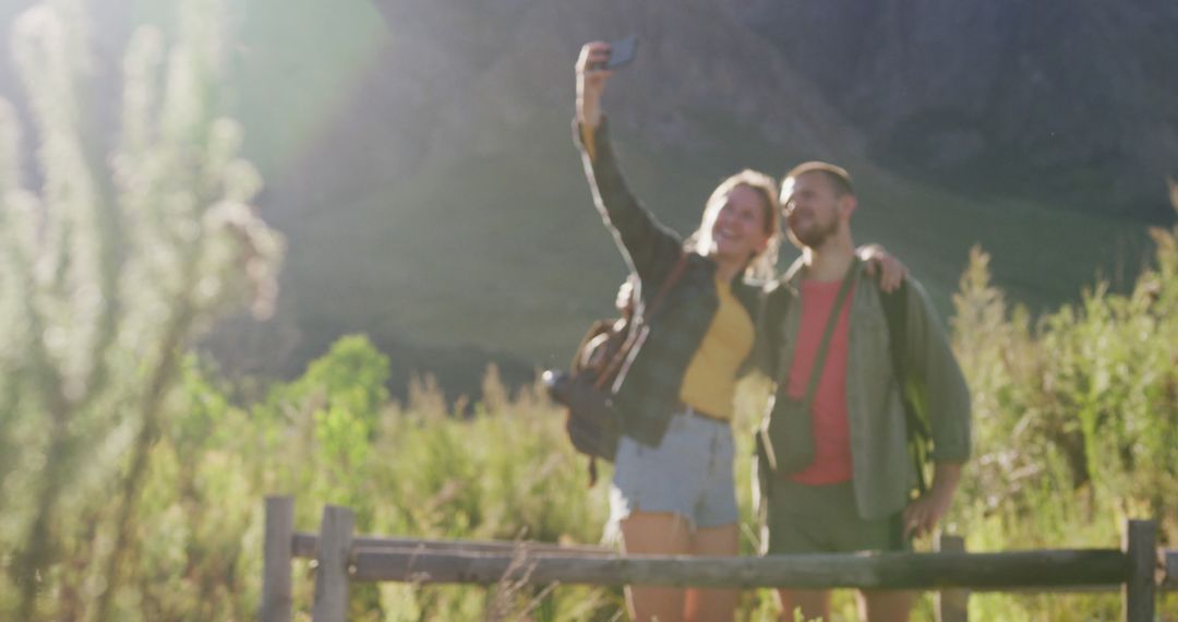 Couple Taking Selfie During Hike in Scenic Mountain Landscape - Free Images, Stock Photos and Pictures on Pikwizard.com