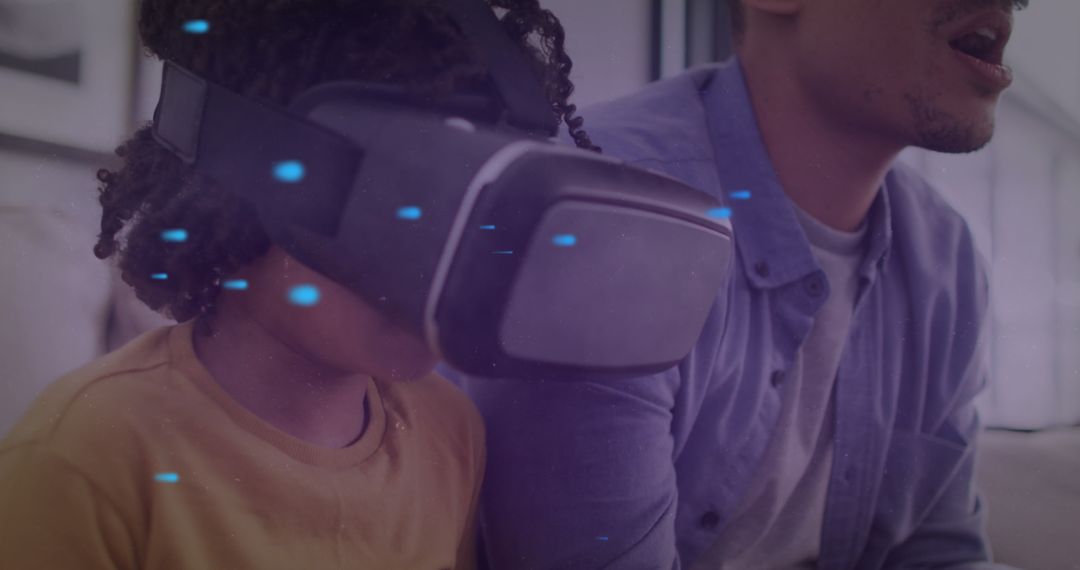 Father and Son Engaging in Virtual Reality Experience