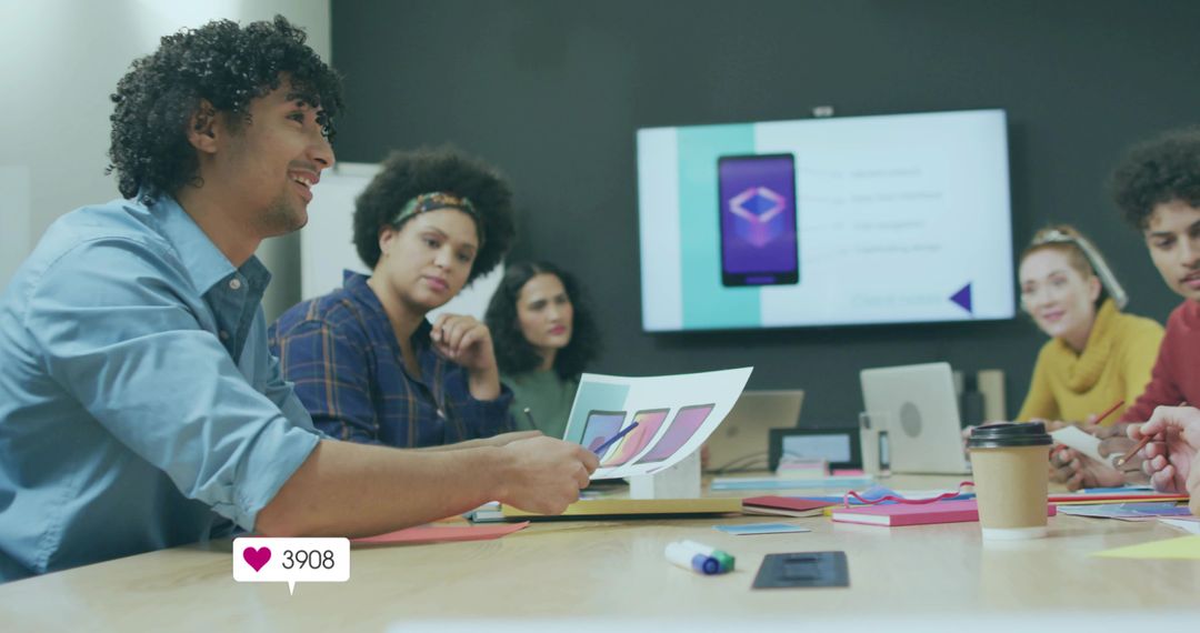 Diverse Team Collaborating During Design Meeting in Modern Workspace