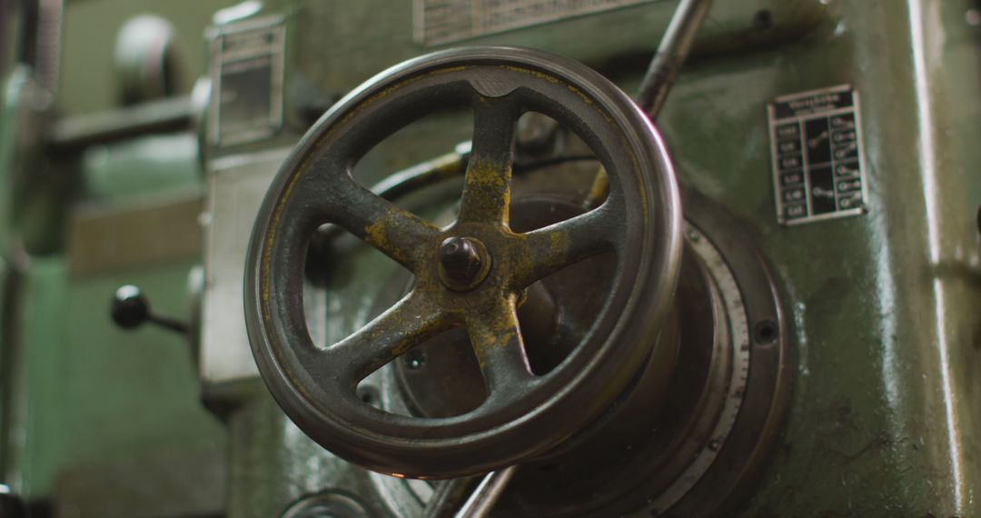 Close-up of Metal Lathe Wheel in Industrial Workshop - Free Images, Stock Photos and Pictures on Pikwizard.com