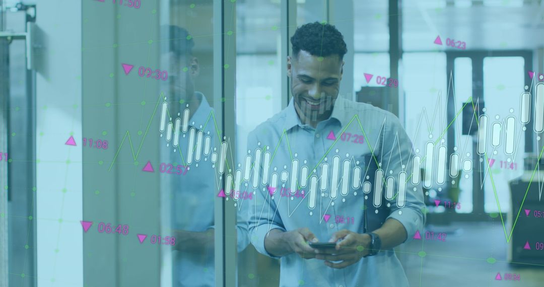 Smiling Businessman Analyzing Mobile Analytics with Overlaid Digital Graphs