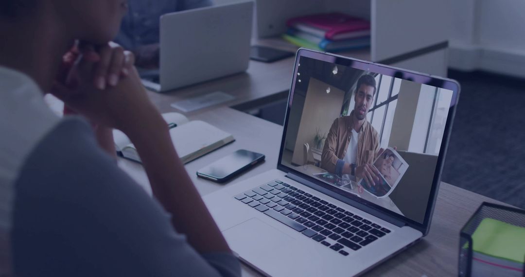 Remote Work Collaboration via Video Conference on Laptop