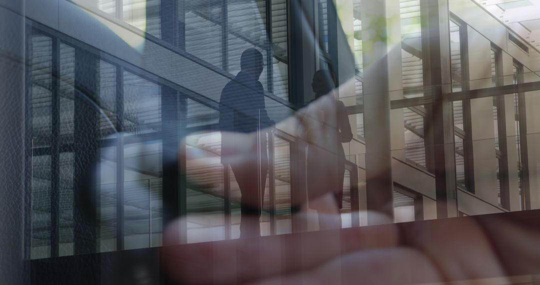 Corporate Discussion Silhouette with Smartphone Reflection