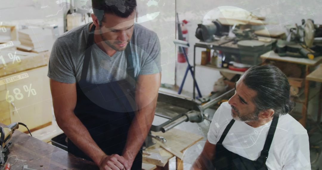 Caucasian Men in Carpentry Workshop Analyzing Financial Data