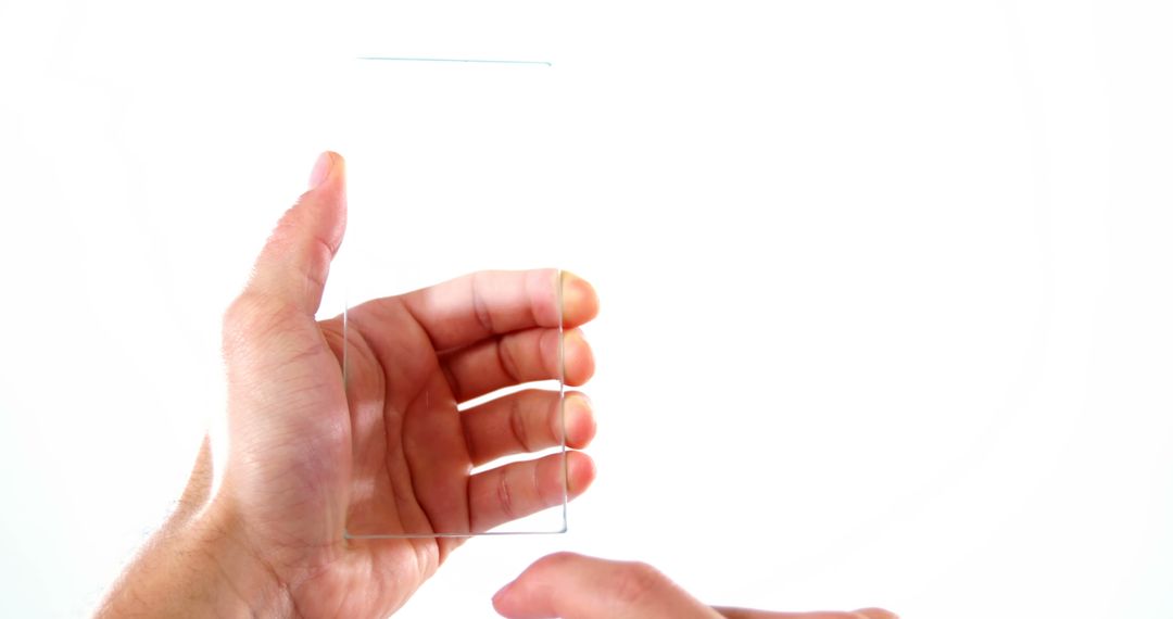 Hands Holding Transparent Smartphone Concept - Free Images, Stock Photos and Pictures on Pikwizard.com