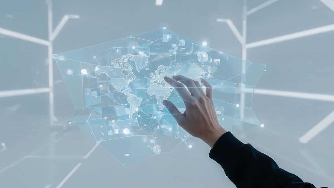 Hand Interacting with Futuristic Holographic World Map