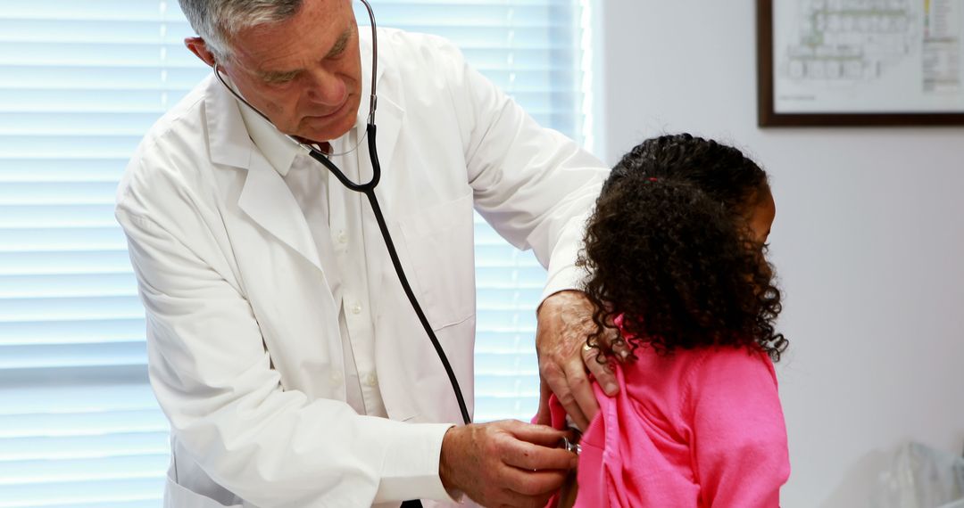 Doctor Examining Young Girl with Stethoscope in Medical Office - Free Images, Stock Photos and Pictures on Pikwizard.com