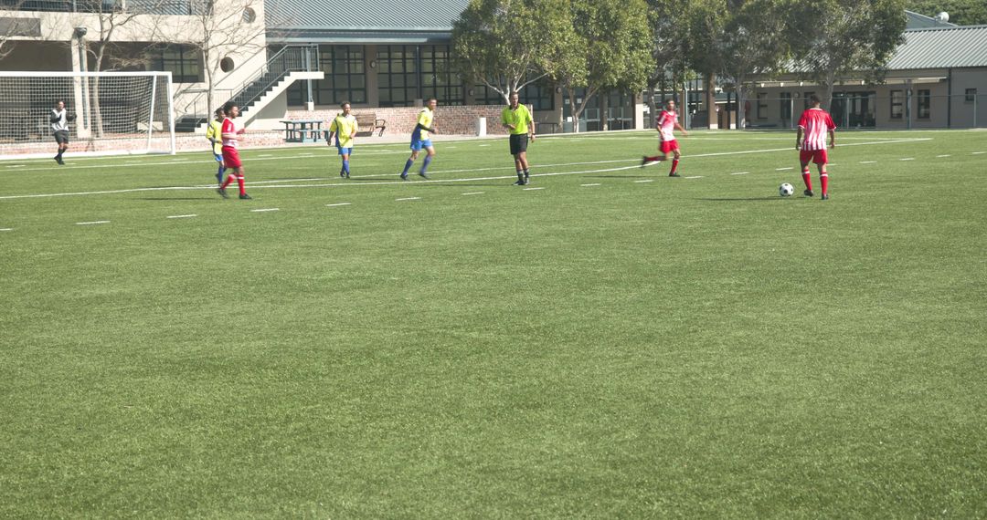 Soccer Teams Prepare for Kickoff on a Sunny School Field