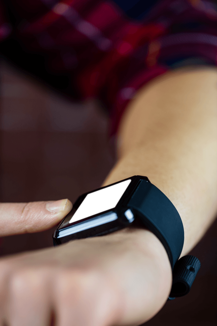 Hands Adjusting Latest Model of Transparent Smartwatch for Fitness