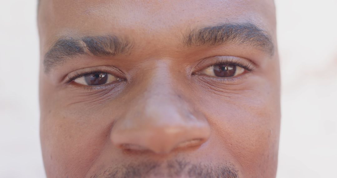 Close-Up View of Man's Eyes and Face - Free Images, Stock Photos and Pictures on Pikwizard.com