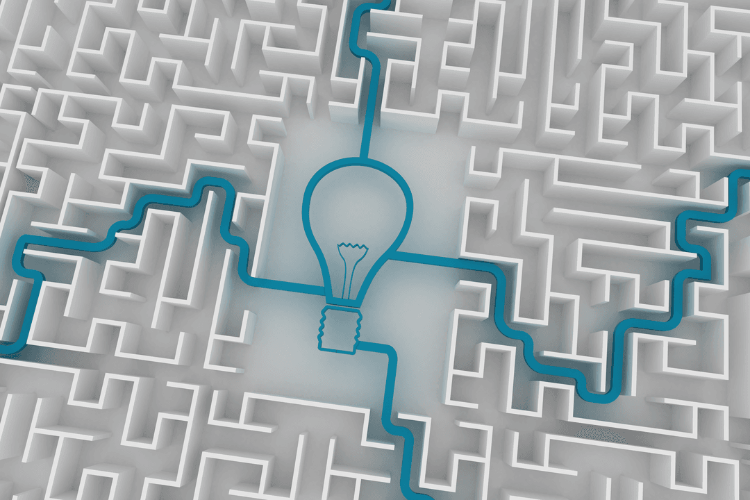 Transparent Light Bulb Within Intricate Maze Pathways