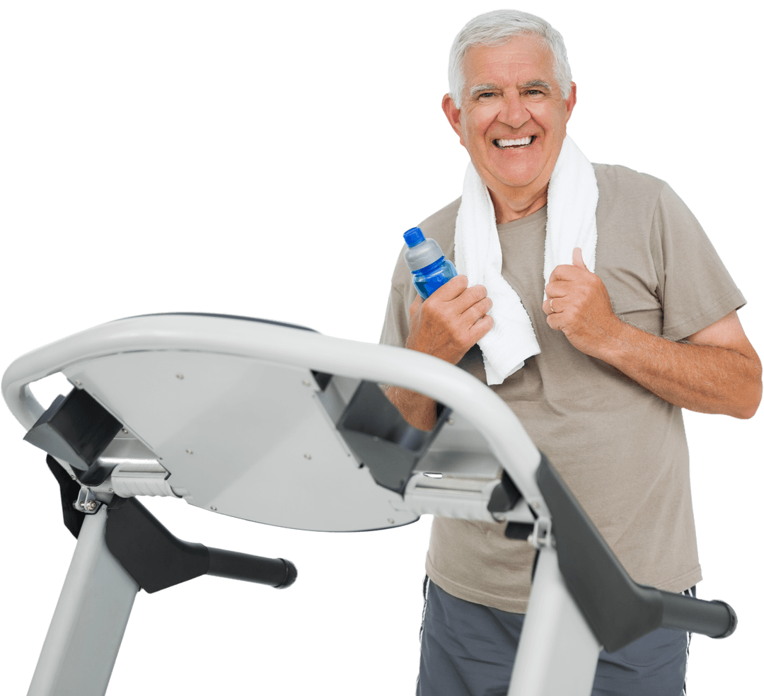 Senior Man Smiling with Treadmill and Towel