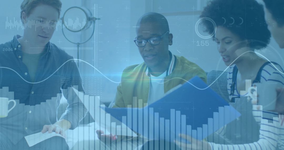 Colleagues Analyzing Financial Data at Meeting Table