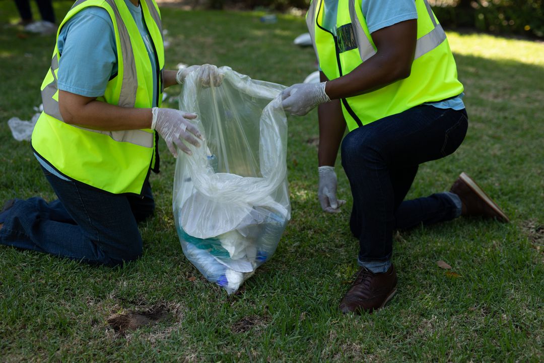 Volunteers Collecting Trash in Countryside - Free Images, Stock Photos and Pictures on Pikwizard.com