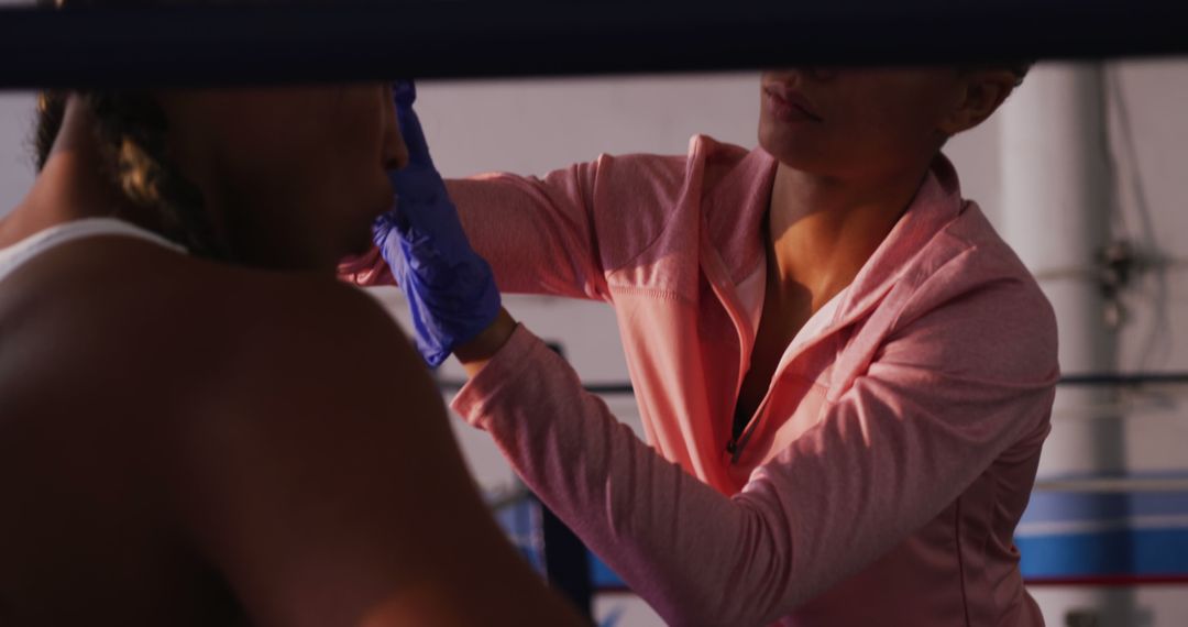 Female Boxer Receiving Medical Attention in Boxing Ring - Free Images, Stock Photos and Pictures on Pikwizard.com