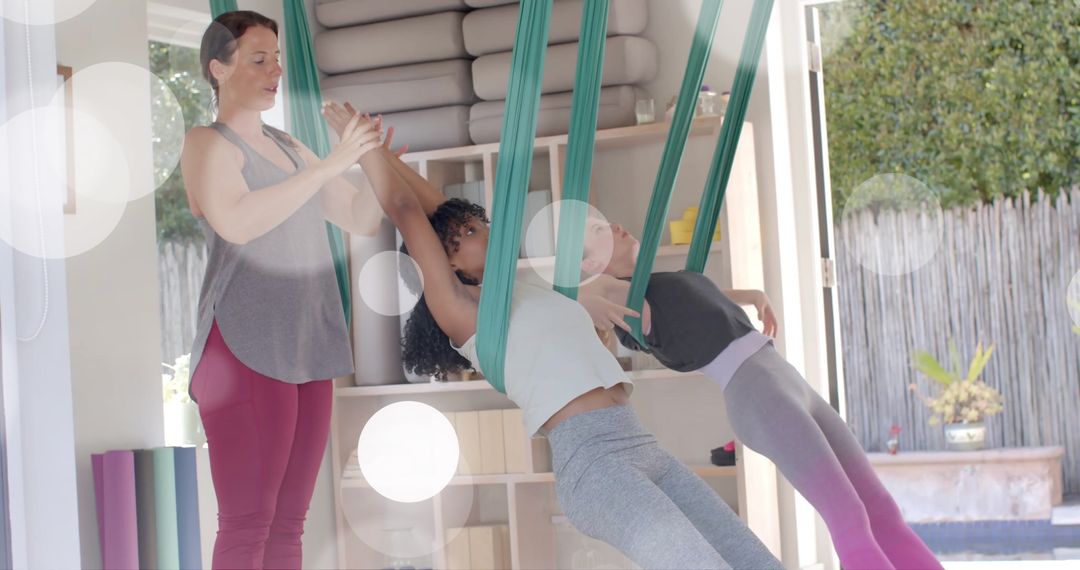 Diverse Teens Enjoying Aerial Yoga at Home for Wellbeing and Fun