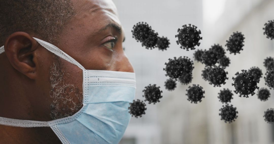 Close Up of Man Wearing Face Mask with Viral Particles