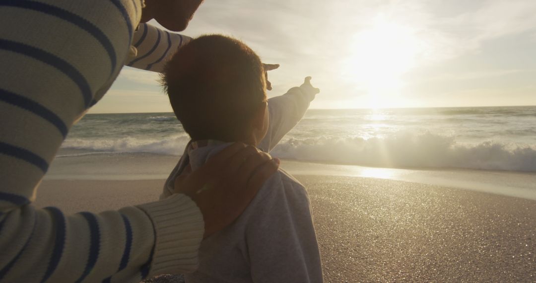 Father and Son Bonding While Watching Beach Sunset