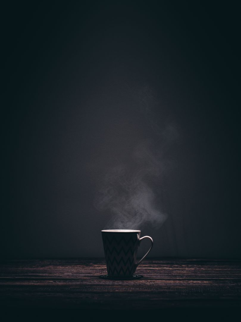 Steaming Coffee Mug on Dark Wooden Table with Minimalistic Background - Free Images, Stock Photos and Pictures on Pikwizard.com