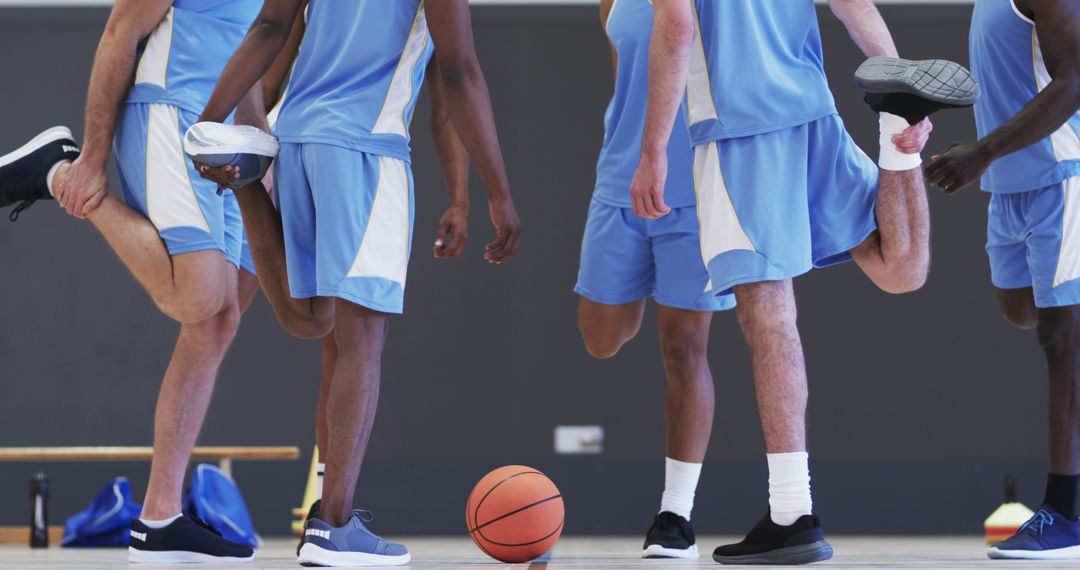 Basketball Team Stretching Before Game