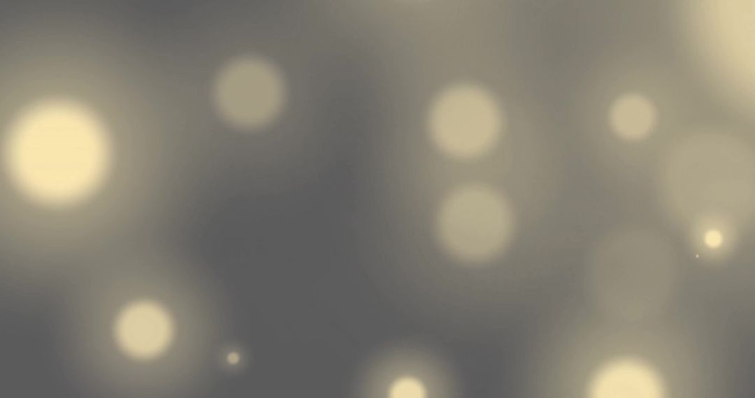 Soft Glowing Light Spots on Grey Background