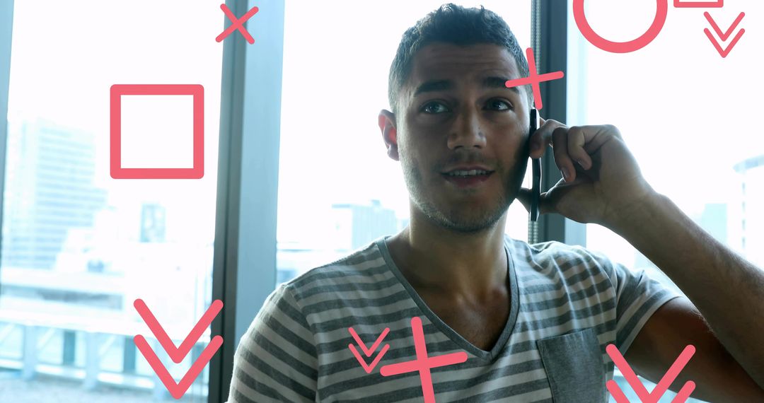 Man Engaged on Smartphone with Urban Skyline Background