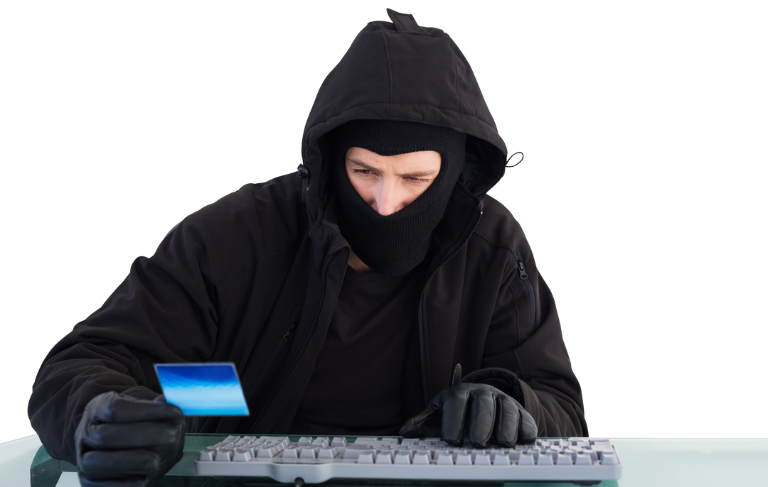 Hacker in Black Hood and Gloves, Using Laptop with Credit Card, Transparent Background - Download Free Stock Images Pikwizard.com