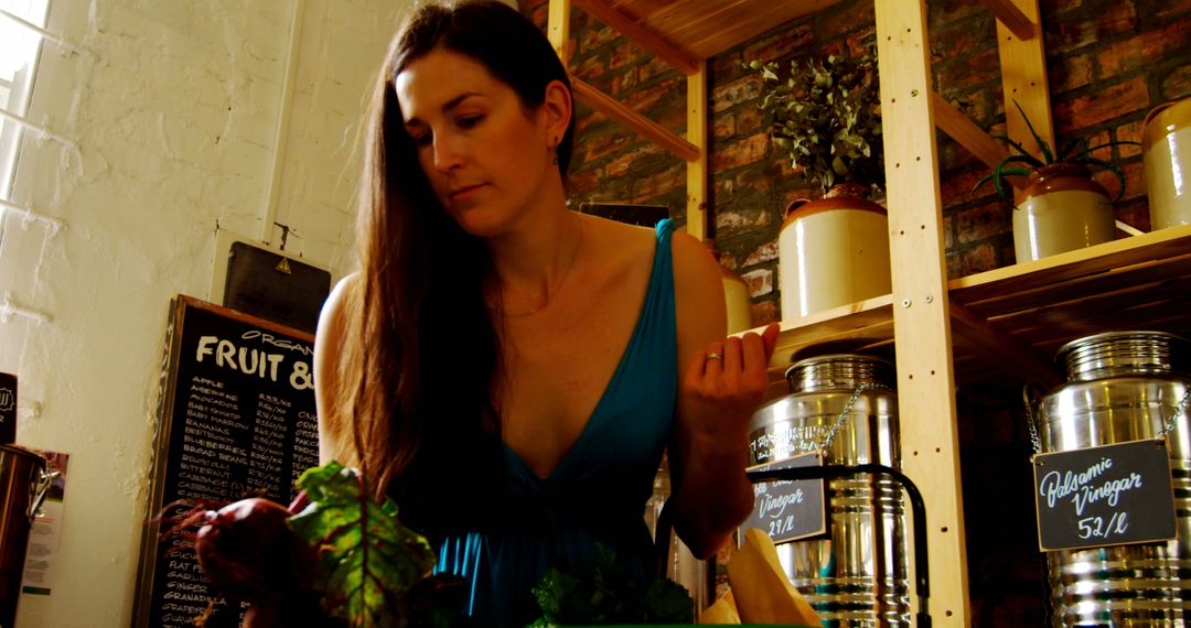 Woman Selecting Fresh Vegetables in Organic Grocery Store - Free Images, Stock Photos and Pictures on Pikwizard.com