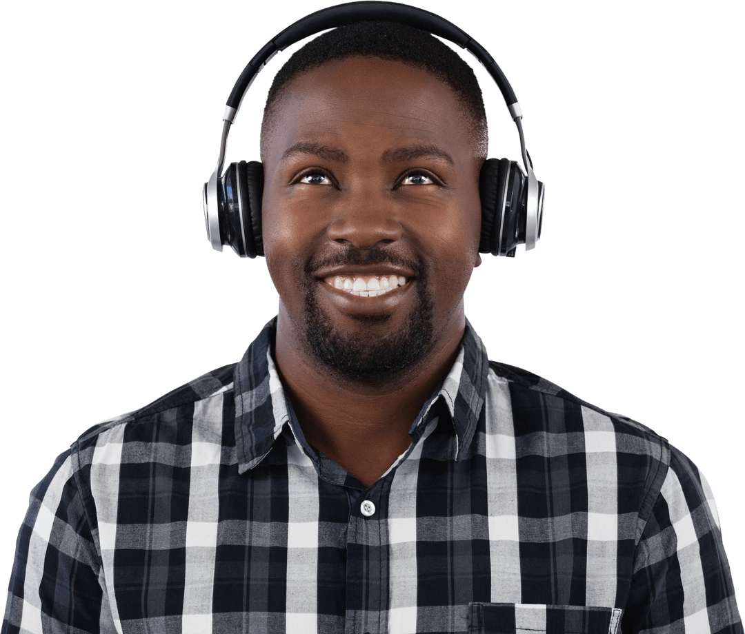 Joyful Man Wearing Headphones Smiling Upwards with Checkered Shirt