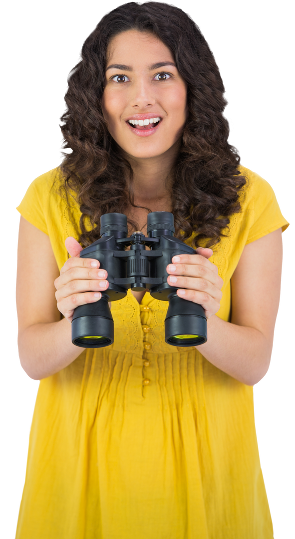 Smiling Young Woman in Yellow Dress Holding Black Binoculars - Download Free Stock Images Pikwizard.com