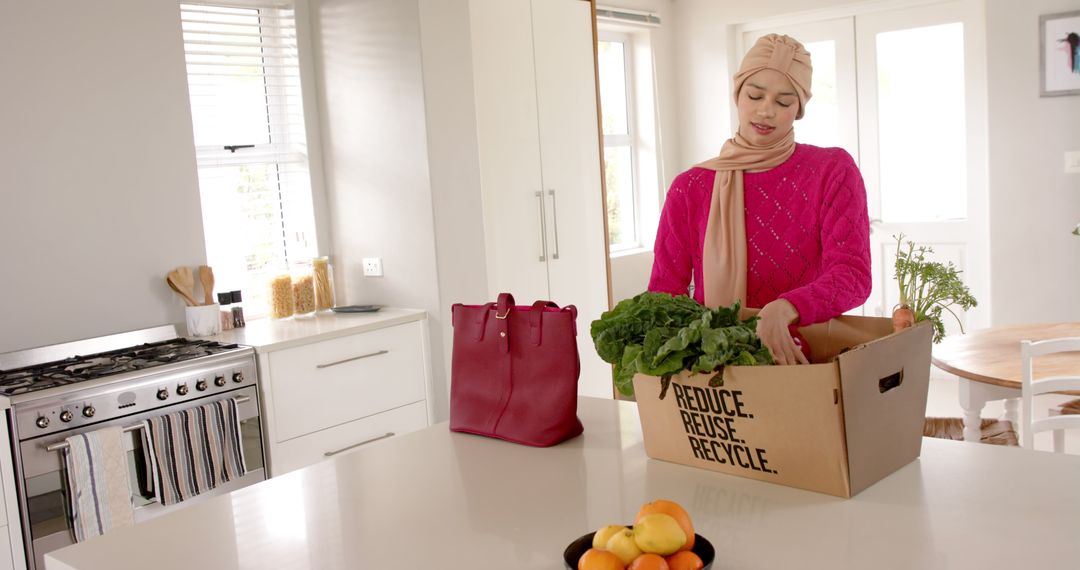 Woman Unpacking Fresh Groceries in Modern Kitchen - Free Images, Stock Photos and Pictures on Pikwizard.com