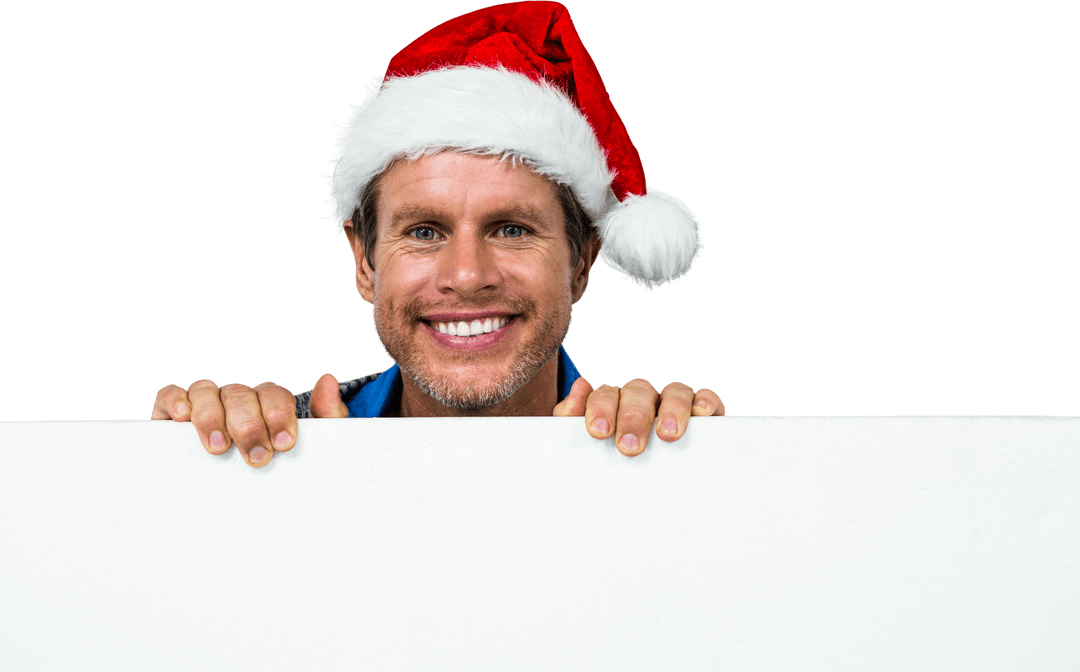 Smiling Man in Santa Hat Peeking Over Blank Sign Transparent Background