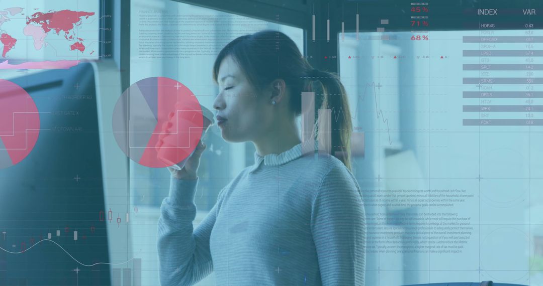 Asian Analyst with Digital Data Display in Modern Corporate Office