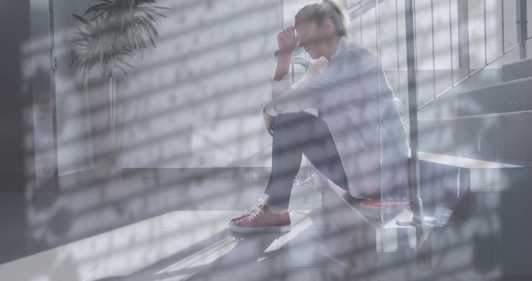Stressed Doctor Sitting on Stairs with Rain Reflection