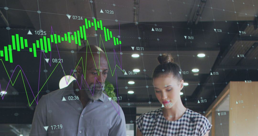 Diverse Team Collaborating on Business Analytics with Growth Charts