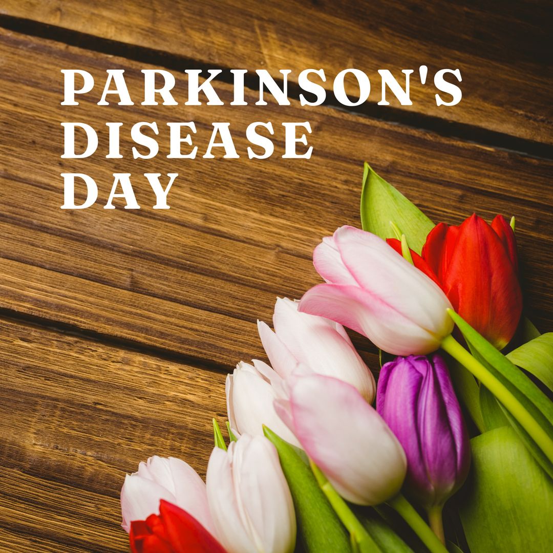 Parkinson's Disease Day Awareness with Multicolored Tulips on Wooden Table - Download Free Stock Templates Pikwizard.com