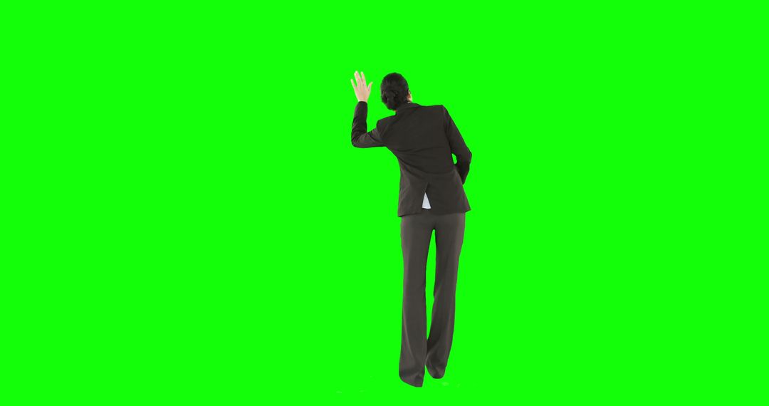 Businesswoman Waving Goodbye on Bright Green Background - Free Images, Stock Photos and Pictures on Pikwizard.com