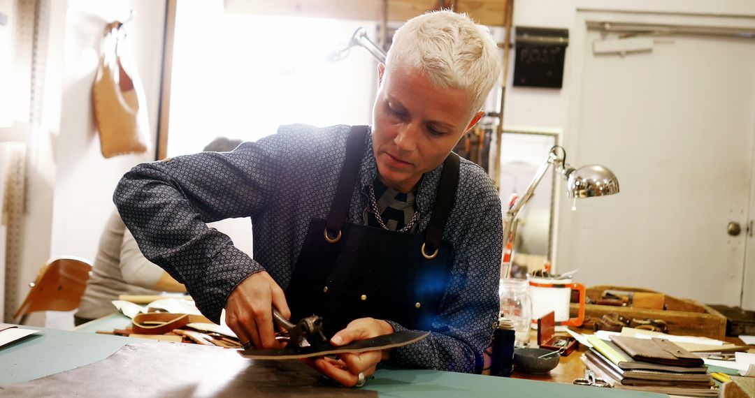 Craftsperson Creating Leather Goods at Workshop - Free Images, Stock Photos and Pictures on Pikwizard.com