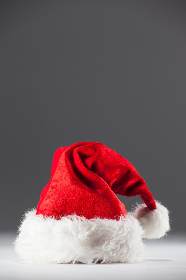 Close-Up of Santa Hat on White Background - Free Images, Stock Photos and Pictures on Pikwizard.com