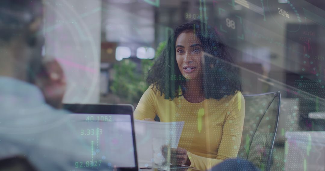 Diverse Professionals Analyzing Data Insights in Office Environment