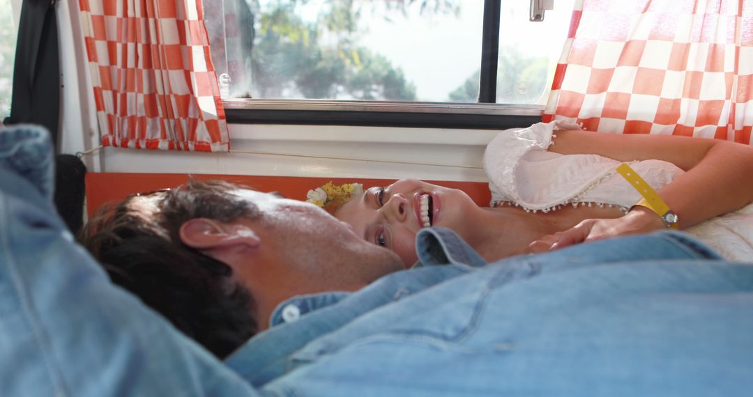 A couple enjoys a romantic, intimate moment inside their cozy camper. - Free Images, Stock Photos and Pictures on Pikwizard.com