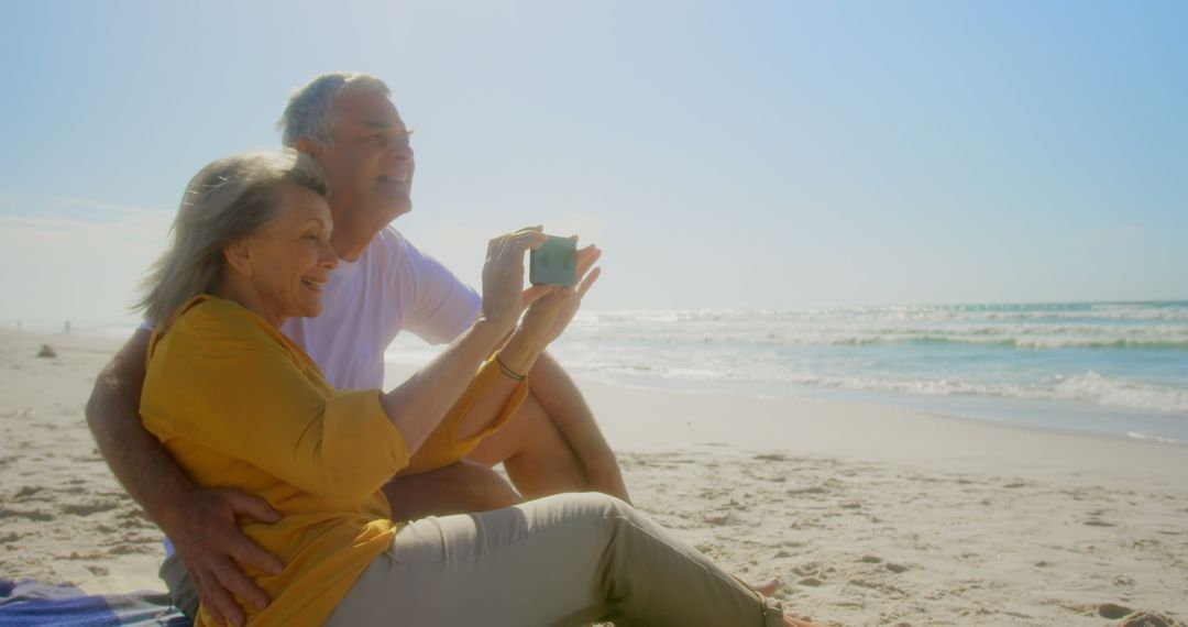 Active Senior Couple Enjoying Beach During Daytime Photography Session