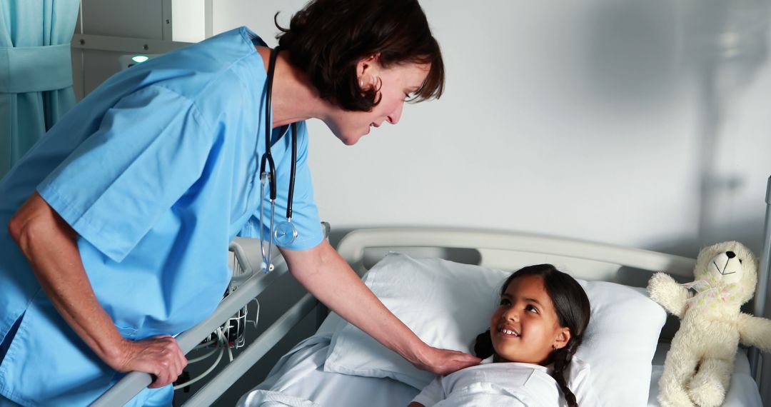 Female Nurse Comforting Young Girl in Hospital Bed - Free Images, Stock Photos and Pictures on Pikwizard.com