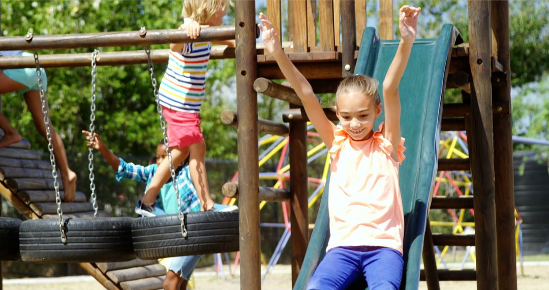 Children Enjoying Playground Activities on a Sunny Day - Free Images, Stock Photos and Pictures on Pikwizard.com