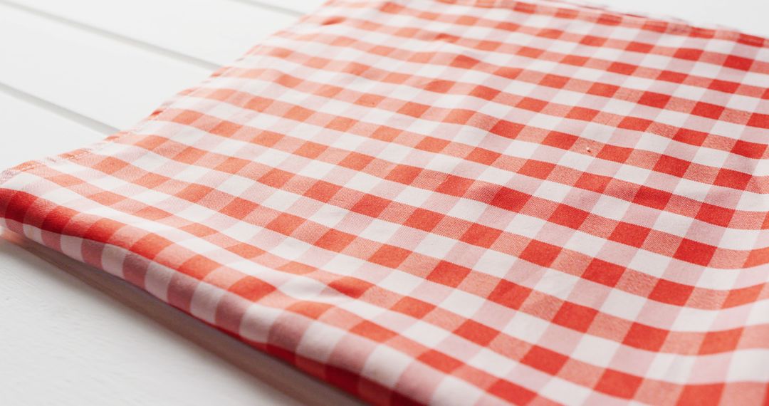 Red and White Checkered Tablecloth on Wooden Surface - Free Images, Stock Photos and Pictures on Pikwizard.com