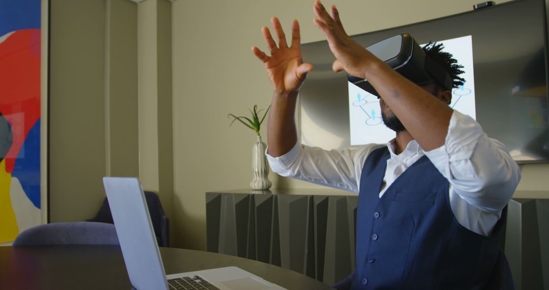 Businessman Wearing VR Headset in Modern Office - Free Images, Stock Photos and Pictures on Pikwizard.com