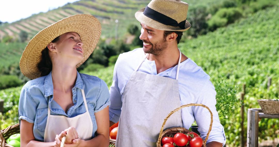 Happy Farmers Holding Freshly Harvested Tomatoes - Free Images, Stock Photos and Pictures on Pikwizard.com